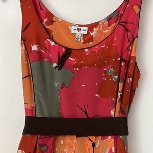 Anthropologie Dress with pockets! Size 8. Hits at knee and ties in back.